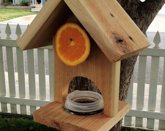 Arched cedar jelly feeder and sliced fruit holder