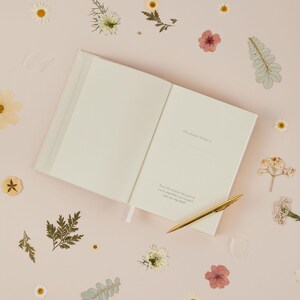 Undated mum journal allowing you to write the date and record memories over five years