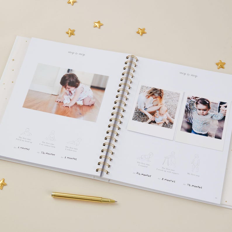 Aqua baby memory journal with a light blue cover and luxury gold foil accents. Inside are 114 guided pages to record a child’s journey from pregnancy to age 5, including spaces for notes, photographs, and milestones such as first steps and birthdays. The design is completely gender-neutral and suitable for baby girls and boys. Packaged in a coordinating foiled presentation box, this aqua baby record book is a timeless keepsake gift.