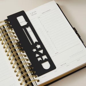 Elegant black vegan leather planner 2026 daily diary with time-blocking sections, productivity organiser for professionals.