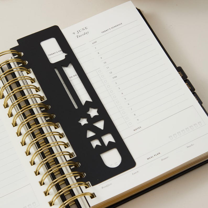Elegant black vegan leather planner 2026 daily diary with time-blocking sections, productivity organiser for professionals.