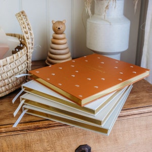 Keep track of your pregnancy journey with our adorable rainbow-themed diary. Document each week's milestones and cherish the memories forever.