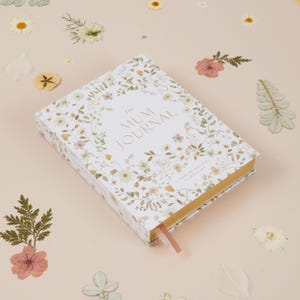 Mum journal wildflower design featuring a soft, calming aesthetic, perfect for recording meaningful motherhood moments in a beautiful keepsake format.