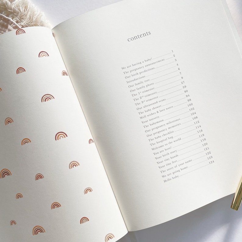 Capture your pregnancy journey in our gender-neutral rainbow-themed journal, an ideal gift for baby showers and expecting friends.