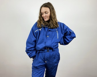 vintage 80s RODEO Ski Suit Bleu Marine Une Pièce Ski Suit Hipster Bleu Neige Pantalon Avec Ceinture Outdoor Winter Wear Snow Gear Jumpsuit Taille XL