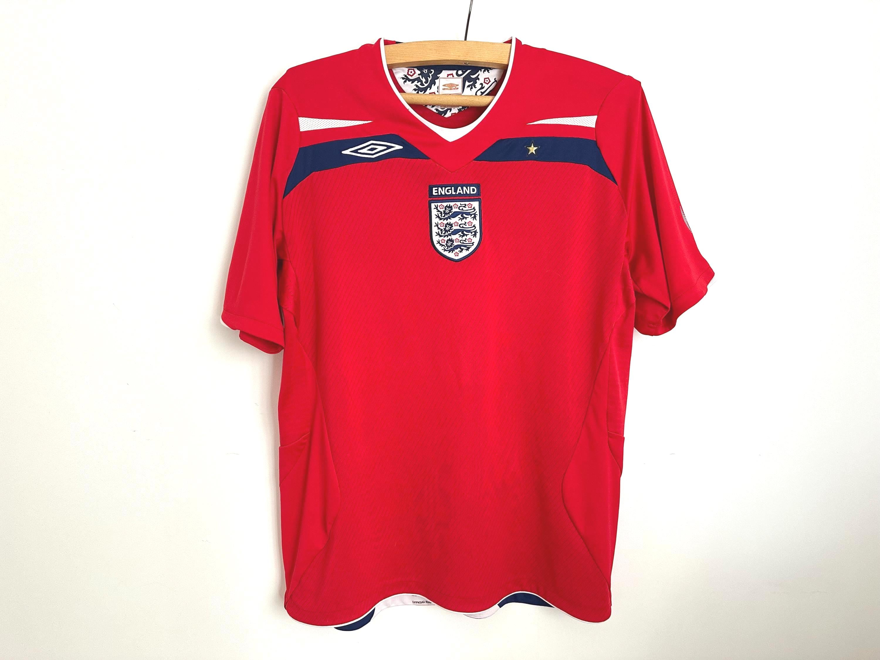 ウェア 00s UMBRO England soccer T-shirt il_fullxfull.7001953549_e2x2.jpg