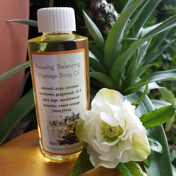 Relaxing aromatic massage oil. Balancing body oil. Soothing