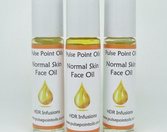 Face oil for normal skin types. Night treatment oil, natural moisturising aromatherapy essential oil rollerball blend