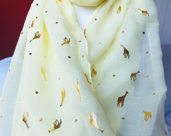 Lovely gold giraffe design on yellow scarf, bnwt
