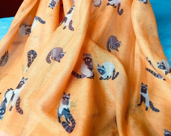Cute raccoon design on orange scarf, bnwt