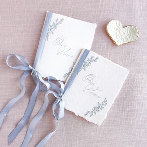 Handmade paper wedding vow books with silk ribbon. Personalized wedding vow books. Romantic vow books. Dusty blue and blush. Keepsake vows.