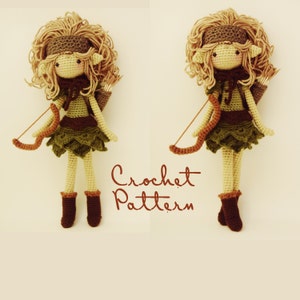 May include: Two crocheted dolls with brown hair, green dresses, and brown boots. Each doll is holding a bow and arrow. The dolls are standing on a white background. The text "Crochet Pattern" is written in brown below the dolls.