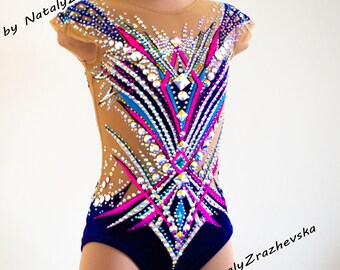 May include: A navy blue leotard with a sheer mesh overlay. The leotard is decorated with rhinestones and colorful geometric designs. The text "by NatalyZrazhevska" is printed on the leotard.