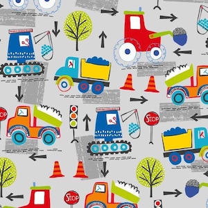 May include: A repeating pattern featuring colorful construction vehicles, trees, traffic cones, and stop signs on a gray background. The design includes trucks, tractors, and diggers, with arrows indicating direction. The overall theme is construction and transportation.