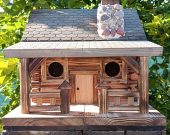 Birdhouse log cabin with front porch