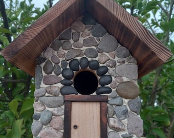 Bird house with stone front and stone covered chimney