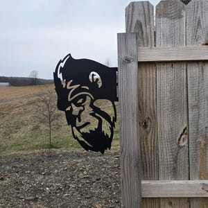 Sasquatch Peeking Metal Yard Art: Flat Black Outdoor Decor
