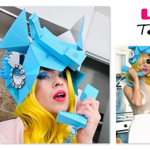 May include: A woman wearing a blue and silver telephone-shaped hat and holding a blue telephone. The hat has a rotary dial and a cord. The woman has bright yellow hair and is wearing pink lipstick. The text "LADY Teleph" is visible in the background.