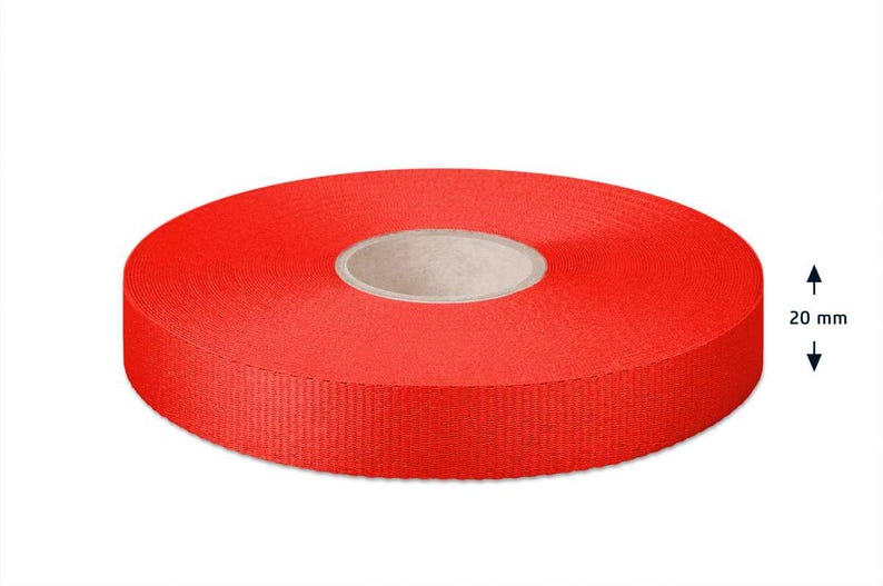 May include: A roll of bright red ribbon, 20 mm wide.