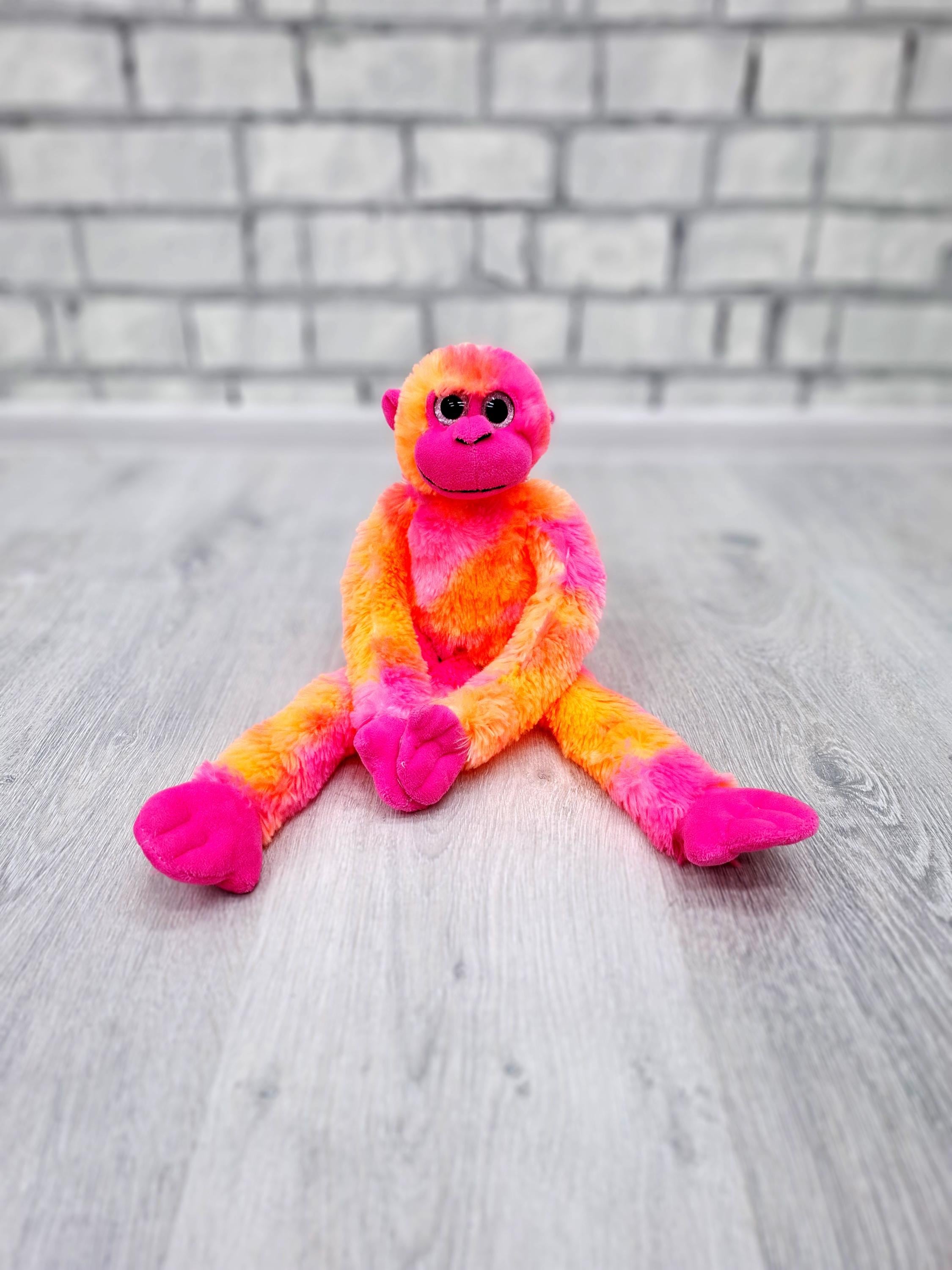 Orange monkey stuffed animal shop
