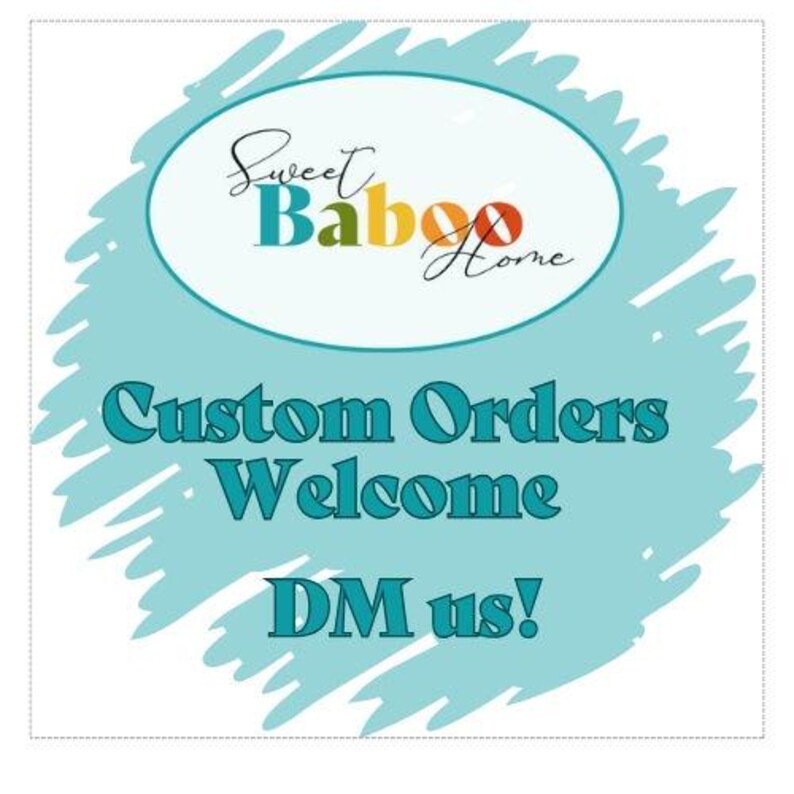May include: A turquoise blue background with a white oval containing the text "Sweet Baboo Home". The text "Custom Orders Welcome DM us!" is written in a dark blue font.