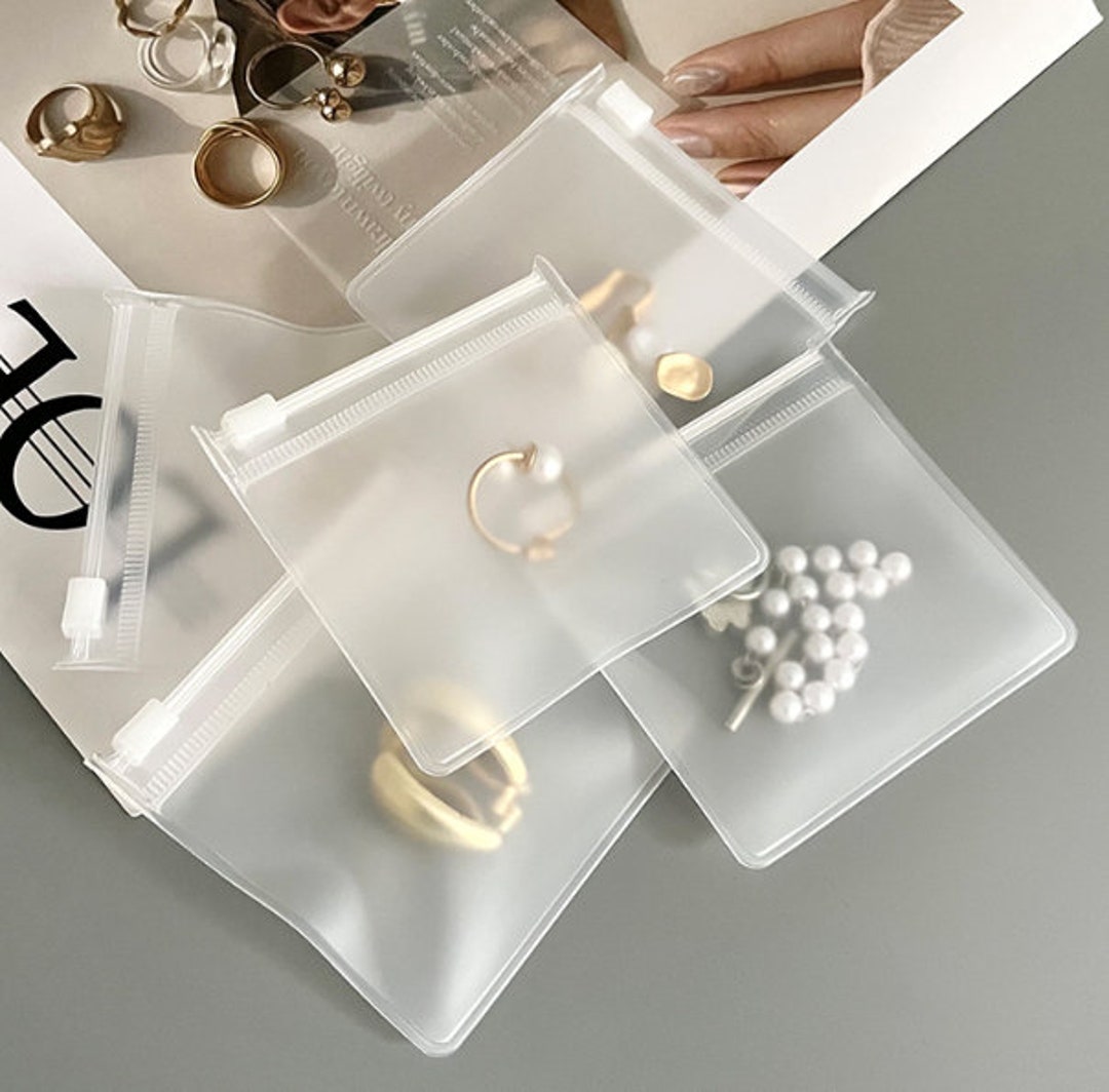 Fnuiddt 100 Pack PVC Clear Jewelry Anti Oxidation Zipper Bag Antitarnish  Plastic Bags for Packaging Jewelry Rings Earrings Transparent Poly Pouch