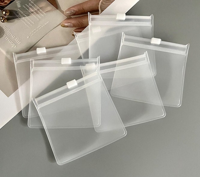 Fnuiddt 100 Pack PVC Clear Jewelry Anti Oxidation Zipper Bag Antitarnish Plastic Bags for Packaging Jewelry Rings Earrings Transparent Poly Pouch