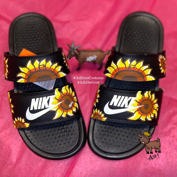 white sunflower nike slides