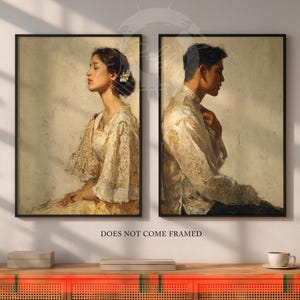 May include: Two framed art prints. One features a woman in a cream-colored dress with lace sleeves, the other a man in a similar shirt. Both portraits are in profile against a neutral background. The text "DOES NOT COME FRAMED" is below the prints.