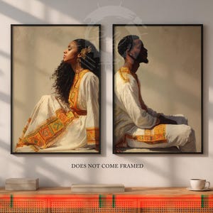 May include: Two framed art prints. One depicts a woman in a white dress with gold and orange embroidery, the other a man in a similar outfit. Both are seated. The text "DOES NOT COME FRAMED" is at the bottom.