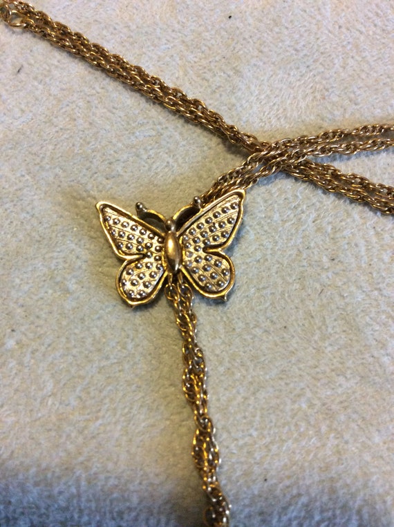avon butterfly necklace