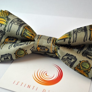 Handmade bow tie for men made up of green satin and silk fabric