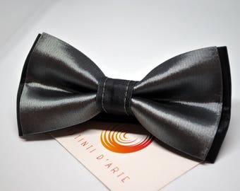 Handmade bow tie for men made up of grey and black silk fabric