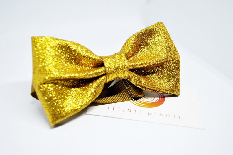 Handmade bow tie made up of golden glitter fabric image 1