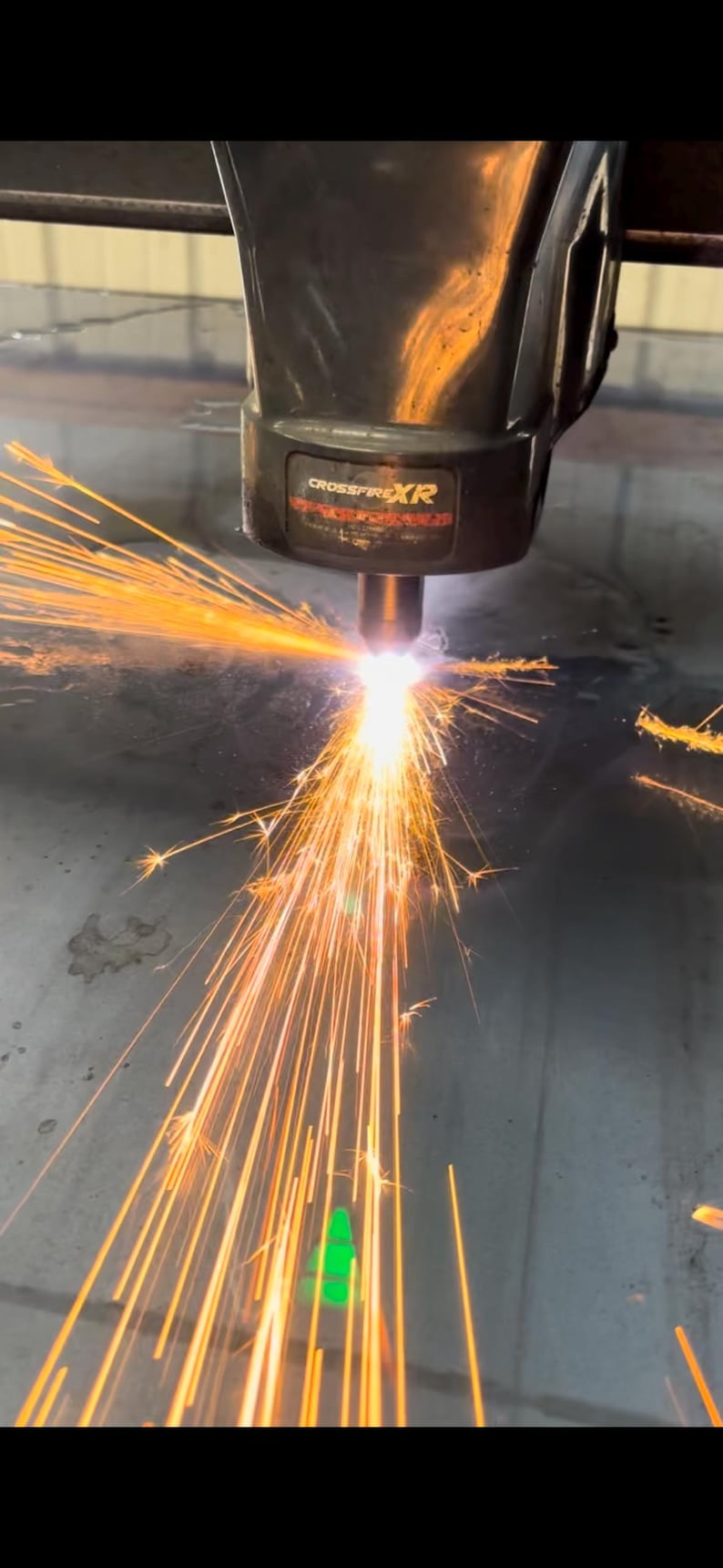 This is our CNC plasma machine cutting our steel metal artwork