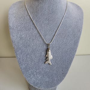 Handmade unique solid silver fish necklace.  20 inch snake chain.