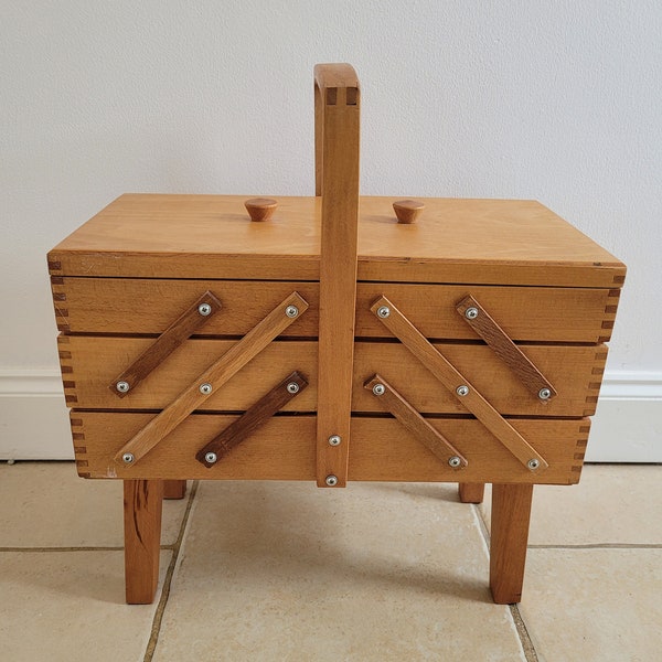Mid Century Solid Wood Cantilever Sewing Box Full Of vintage Sewing craft materials.