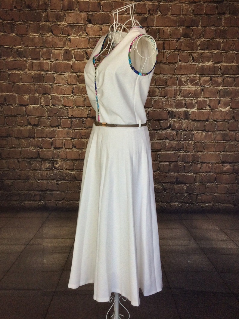 UK 8 Size X Small 1950s Crimplene dress with pleated skirt and belt