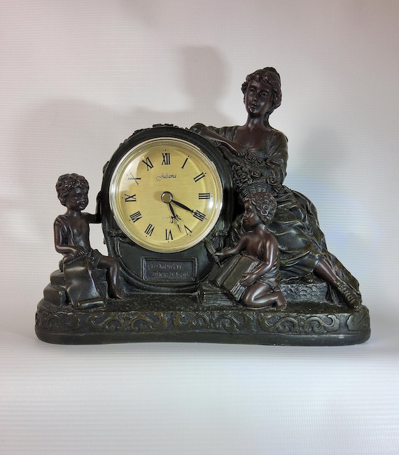 1980s Juliana Quartz Bronze Effect Mantle Clock Featuring Lady and