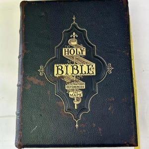 Large Antique leather Illustrated Family Bible Scott And Henry Leather Bound Book with gold edge pages.
