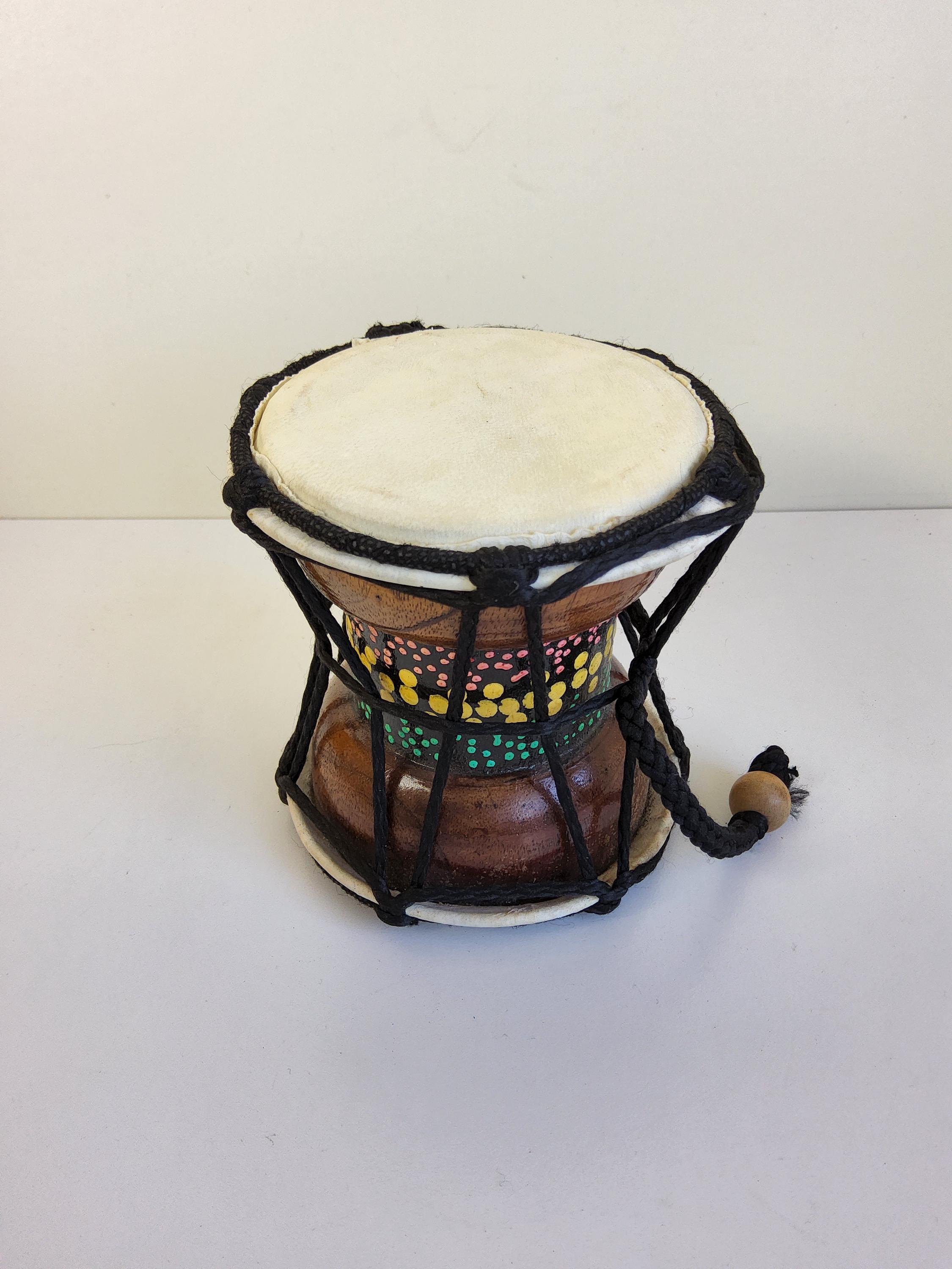 Small vintage Jamaican double sided bongo hand drum, 4 inches high by approximately 4inches  diameter