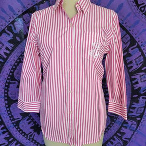 Vintage Ralph Lauren ladies pink and white stripe 3/4 length sleeve blouse. Size medium.