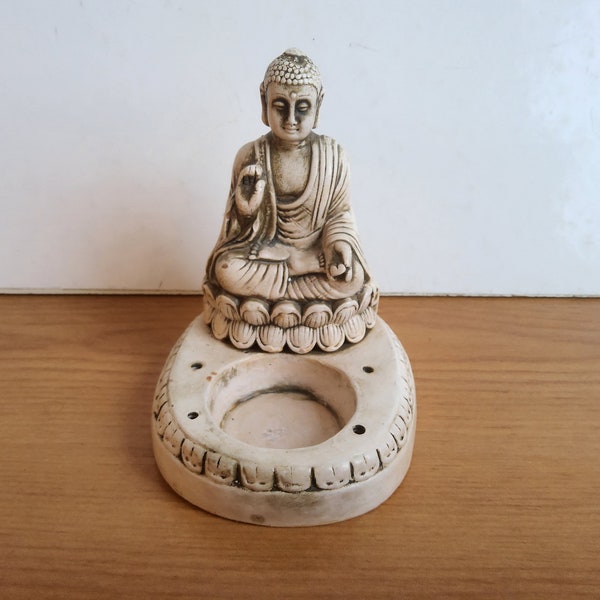 Buddha tea light candle holder and incense joss stick holder.