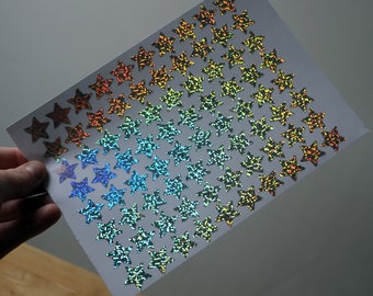 Folha de adesivos A5 com estrelas holográficas - Efeito brilhante prateado - Adesivo removível e colante para arte de parede, planejador, diário, telefone, carro, diário