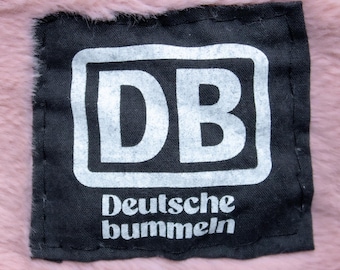 German Bummeln Patch, pink or white on black for sewing on public transport punk left