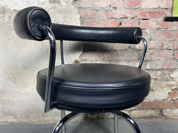 Buy Used LC7 Swivel Chair by Le Corbusier, Charlotte