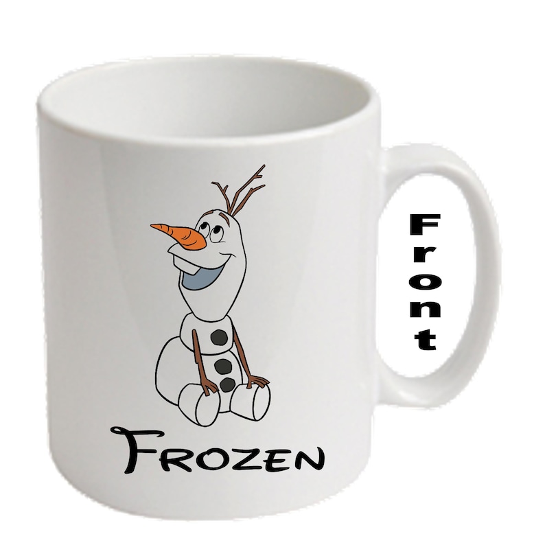 May include: White ceramic mug with a cartoon image of Olaf from Frozen. The design shows Olaf's face, body, and the word "FROZEN" in black. The word "Front" is printed on the handle.