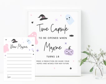 May include: A printable time capsule card with a pink and purple color scheme. The card features a witch's hat, ghosts, and stars. The text on the card reads "Time Capsule to be opened when Maxine turns 18. Make a prediction or share your hopes and wishes for her future."