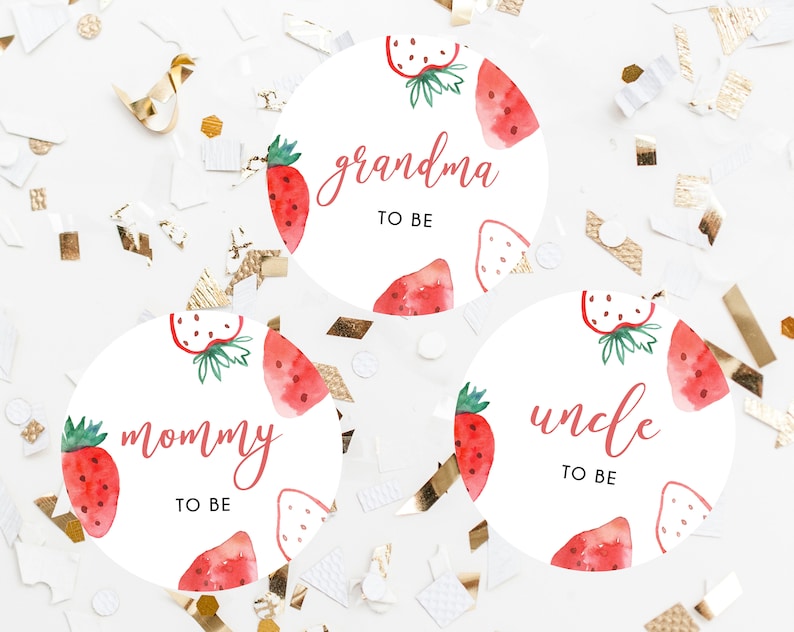 May include: Three round white labels with red watercolor strawberries and the text "mommy to be", "grandma to be", and "uncle to be".