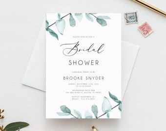 May include: A white bridal shower invitation with a watercolour design of eucalyptus leaves in shades of green. The invitation reads "Please join us for a Bridal Shower honouring bride-to-be Brooke Snyder, Sunday, November 13th, 2021 at 12 o'clock, Moonshine Patio Bar, 303 Red River St, Austin, TX 78701, RSVP by November 1st, Bailey - 512-374-2837."